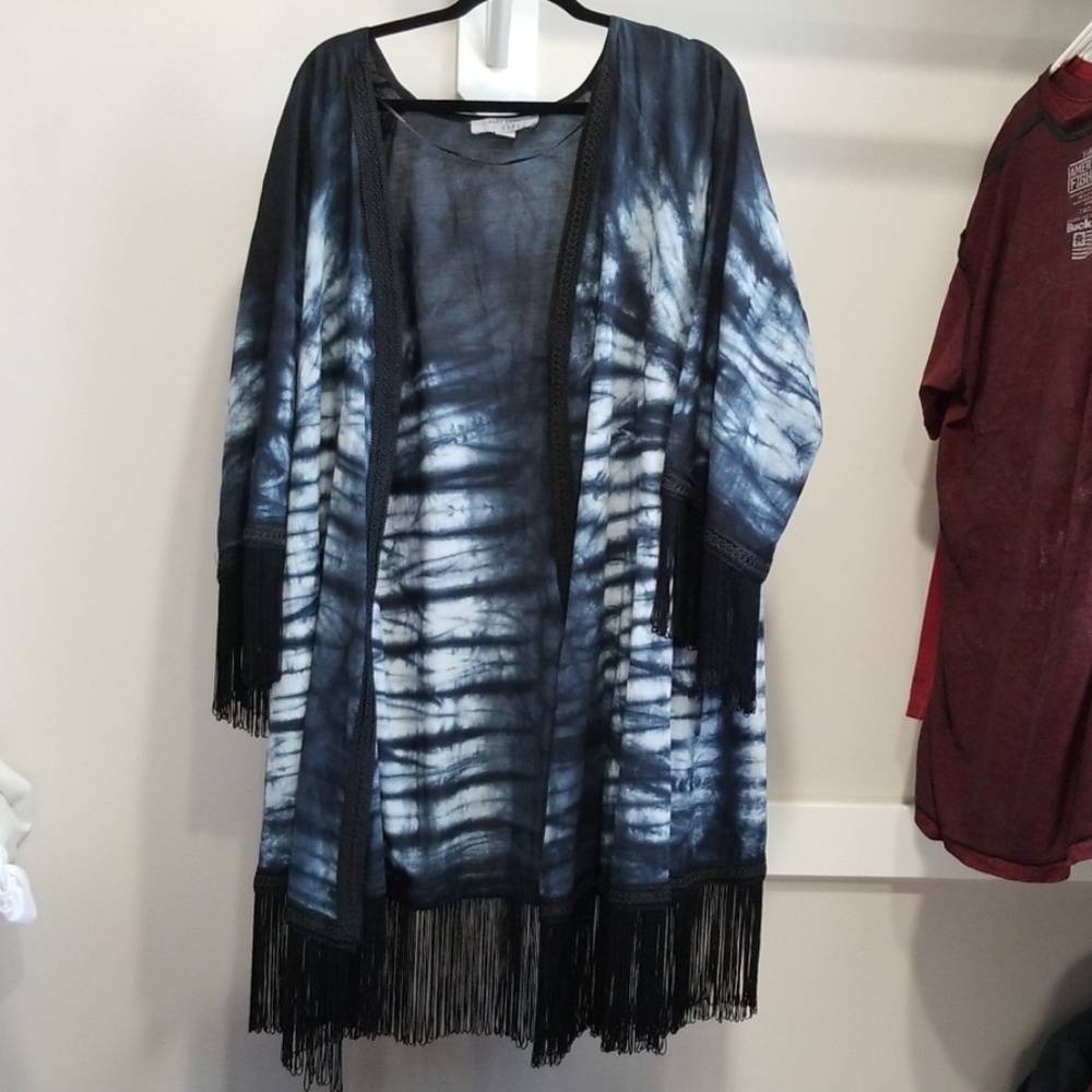 Tye dye kimono with black tassles .